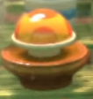 An orange mushroom similar to the Mega Mushroom from the Mario series.