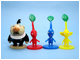 6: The President with leaf Red Pikmin, Blue Pikmin, and Yellow Pikmin.