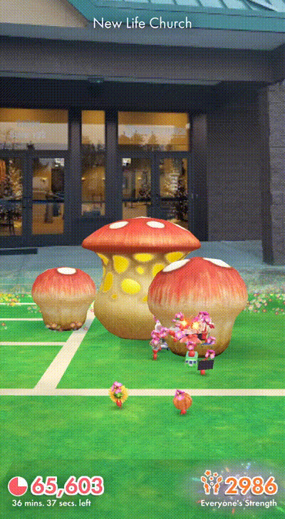 Red Pikmin destroying one part of a small red mushroom.