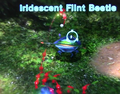 The Iridescent Flint Beetle in an prerelease version of Pikmin 3.