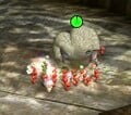 A Mamuta smashing Pikmin into the ground, instantly flowering them.