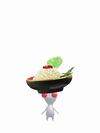 An animation of a White Pikmin with a Osechi from Pikmin Bloom.