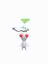 An animation of a white Pikmin with a puzzle piece from Pikmin Bloom.