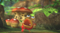 A Dwarf Bulborb in Pikmin 3, about to eat a Red Pikmin.