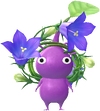 A Purple Special Decor Pikmin with Flower Crown decor from Pikmin Bloom.