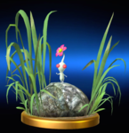 The trophy for White Pikmin in Super Smash Bros. for Nintendo 3DS and Wii U, showing a Pikmin standing on a rock.