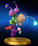 An alternate trophy for Captain Olimar in the Wii U version of Super Smash Bros. for Nintendo 3DS and Wii U, holding a Red Pikmin, White Pikmin, and Purple Pikmin while being carried by two Winged Pikmin.