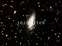 An image of a spiral galaxy from Sozaijiten Vol. 21. The image's description on the website says it was provided by NASA.