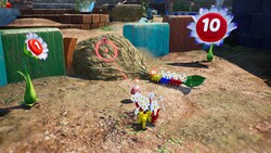 Some Pikmin pulling a giant root next to some Pellet Posies in Pikmin 4.