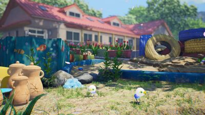 A screenshot of Pikmin 4 showing a house-like area and two Snavian-like creatures.