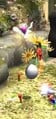 A Honeywisp dropping its egg having been hit by a Pikmin.