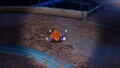 The treasure being carried by multiple Blue Pikmin.