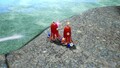 The two treasures each being carried by a pair of Blue Pikmin.