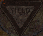The yield sign that is at the start of the area.