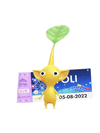 An animation of a Yellow Pikmin with a Theme Park Ticket from Pikmin Bloom