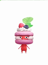 An animation of a Red Pikmin with a Macaron from Pikmin Bloom.