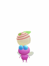 An animation of a Winged Pikmin with a 2026 Chocolate from Pikmin Bloom.