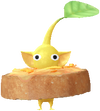A Yellow Bakery Decor Pikmin with Baguette (Rare) decor from Pikmin Bloom.