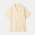 The yellow shirt.