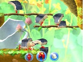 Some Red Pikmin building a bridge with fragments in Hey! Pikmin.