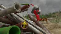 A scene from Occupational Hazards, when a Red Pikmin jumps out of a pipe resembling a Warp Pipe while resembling Mario.