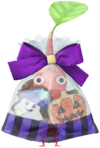 A Red Decor Pikmin wearing a Halloween Treat