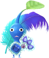 A Blue Special Decor Pikmin with Rio Carnival decor from Pikmin Bloom.