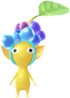 A yellow Decor Pikmin with the Clothing Store costume.