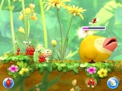A Mockiwi being attacked by some Red Pikmin.