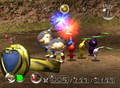E3 2003 screenshot of an early treasure resembling the Pink Menace, but blue. Interestingly, it has a different shape, being a circle on a ring, and that circle having a heart shape in the middle.