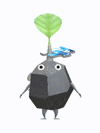 An animation of a rock Pikmin with two puzzle pieces from Pikmin Bloom.