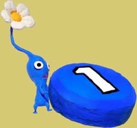 A Blue Pikmin carrying a Pellet of the same color.