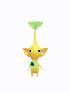 An animation of a yellow Pikmin with a green sticker from Pikmin Bloom.