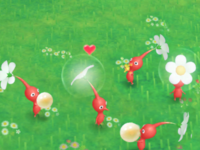 A Pikmin gaining a friendship point by drinking a ball of nectar, as seen in a tutorial image. (This is cropped from a texture used in-game.)
