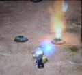Two fire geysers in the Hole of Beasts in Pikmin 2, one inactive and the other one active.