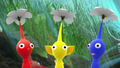 Three Pikmin have an idea in Treasure in a Bottle.