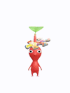 An animation of a red Pikmin with a puzzle piece from Pikmin Bloom.