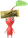 A Red Station Decor Pikmin with Gold Ticket decor from Pikmin Bloom.
