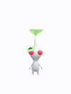 An animation of a white Pikmin with a green sticker from Pikmin Bloom.