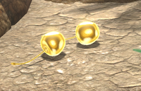 Two Golden Cupid's Grenades.