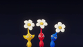 A Yellow Pikmin, along with a Red Pikmin and Blue Pikmin, seen in a promotional short for the The Super Mario Galaxy Movie.