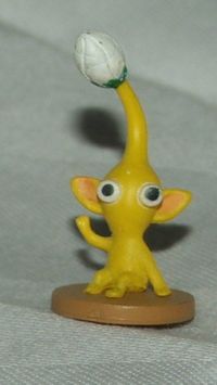 A bud Yellow pikmin figurine from volume 2.