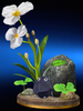 The trophy for a Rock Pikmin in the Wii U version of Super Smash Bros. for Nintendo 3DS and Wii U, sitting beside a creeping burhead.