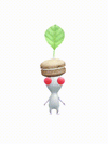 An animation of a White Pikmin with a Macaron from Pikmin Bloom.