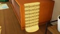 The large climbing wall on the side of the TV stand.