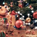 Artwork of Pikmin carrying ornaments in a Christmas scene.