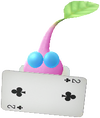 A Winged Special Decor Pikmin with Playing Card decor from Pikmin Bloom.