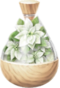 A jar full of white poinsettia petals.