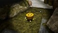 The treasure being carried by 5 Yellow Pikmin.