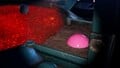 An alternative, more close-up, shot of the treasure in the location it is discovered (partially buried).